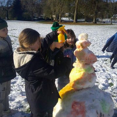A snowy forest school session